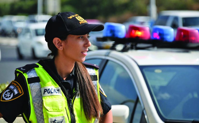 Israel Police Officer and Police Car - Police Chief Magazine