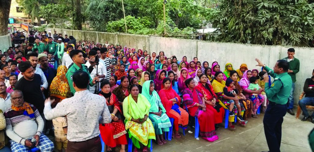 Bangladesh Police officers lead a popular interactive community outreach gathering in a densely populated community in January 2020