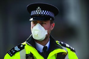 UK masked constable during Coronavirus pandemic