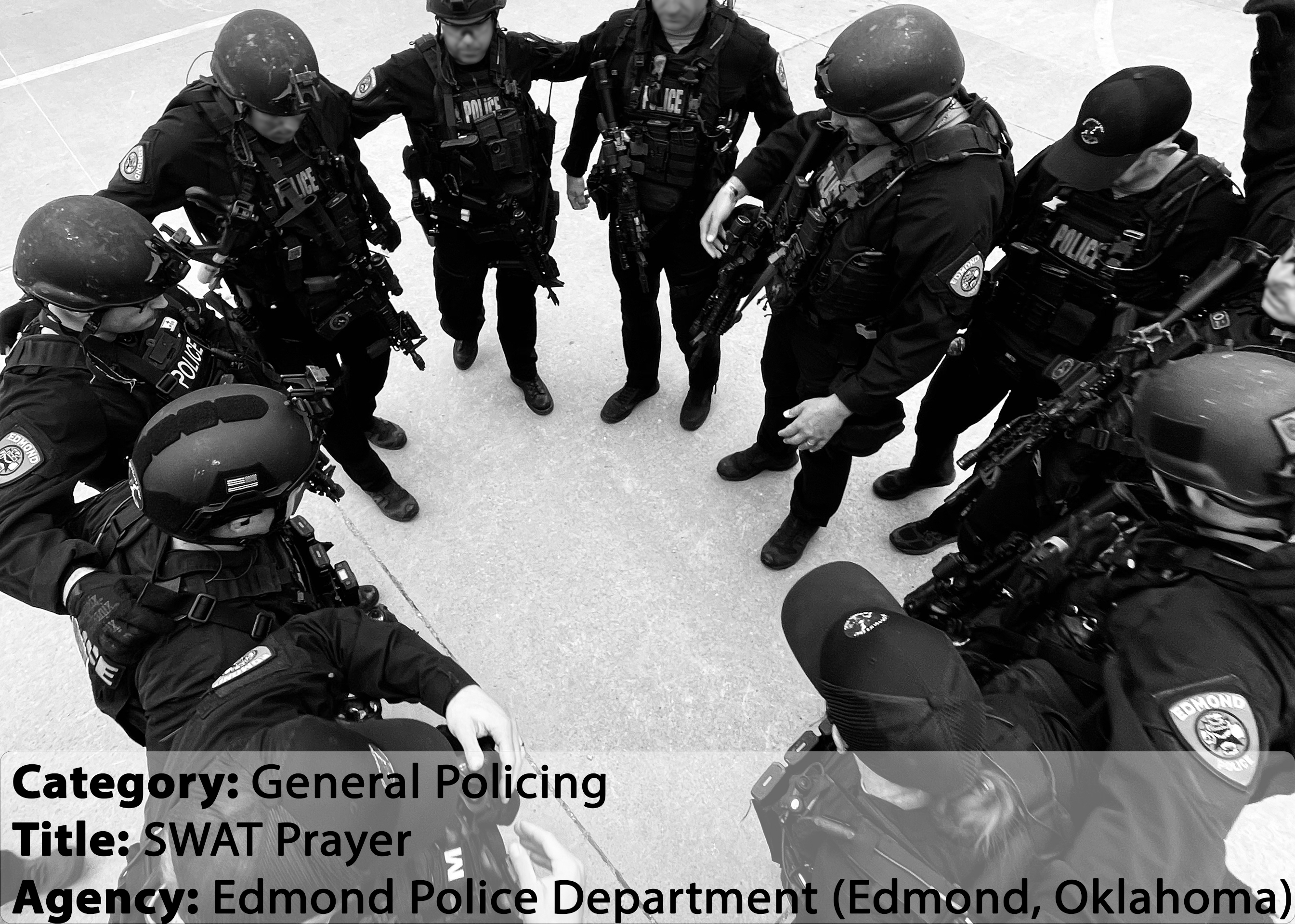 The Edmond Police SWAT team prays together.