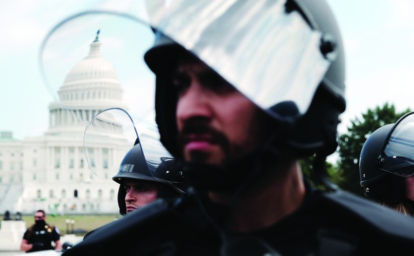 Police in riot gear stand in front of the U.S. Capitol during the 'Justice for J6’ rally in support of those charged in the January 6 attack on the U.S. Capitol on September 18, 2021 in Washington, DC. Protestors to gathered in Washington, DC on Saturday to support over 600 people arrested and charged in connection with the January 6 attempted insurrection at the U.S. Capitol.