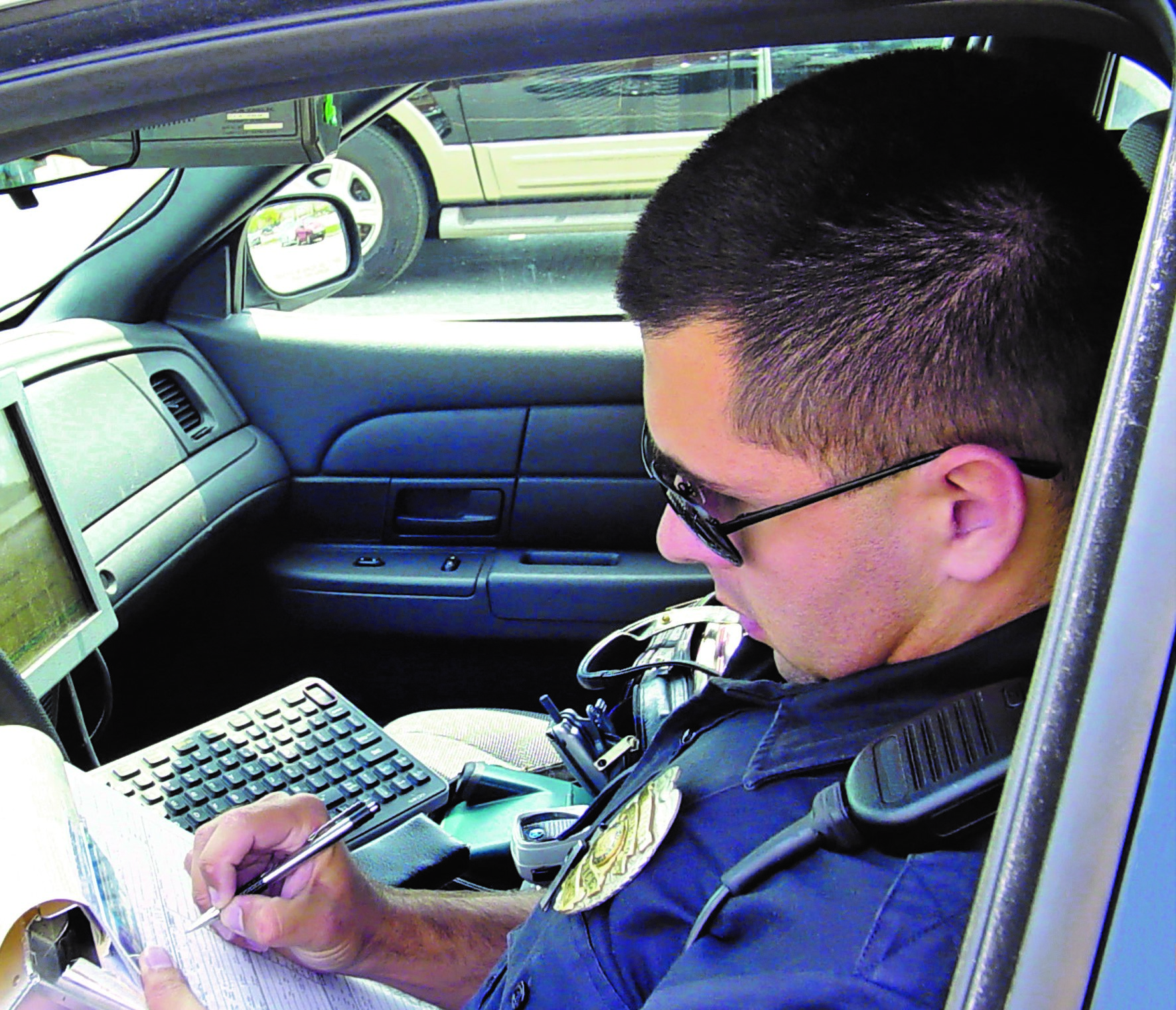 stock photo police writing ticket