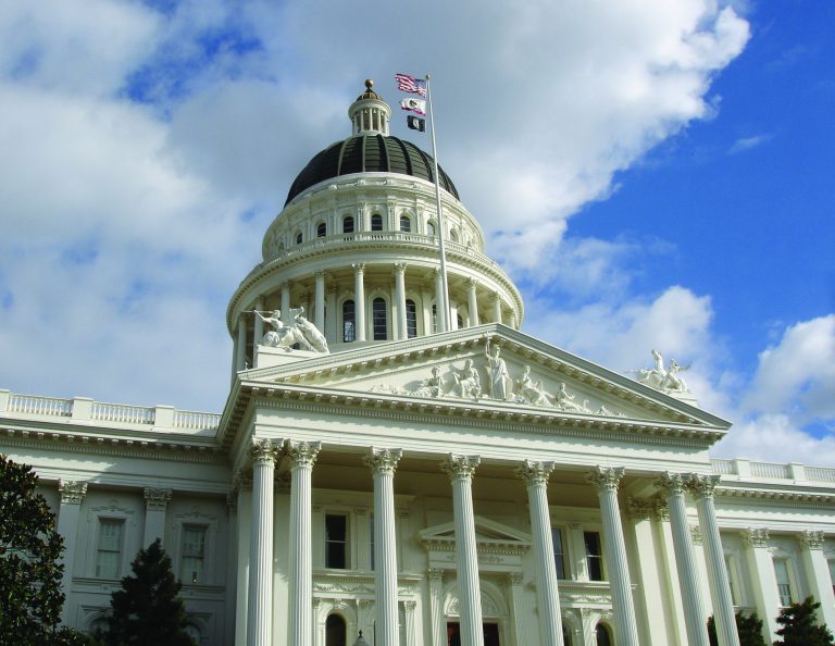 California State Capitol building Sacramento with national flags ...