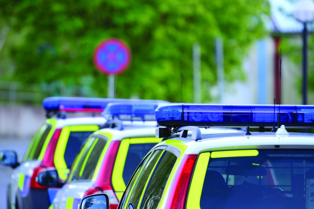 Stockholm Police cars in the evening