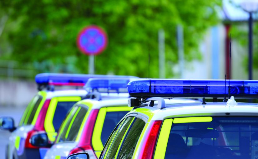 Stockholm Police cars in the evening