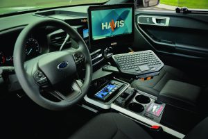 Vehicle console including mobile terminal with adjustable screen and keyboard.