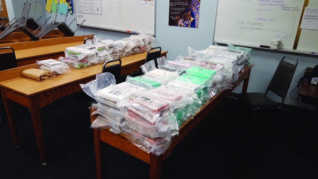 confiscated packages of cocaine on tables