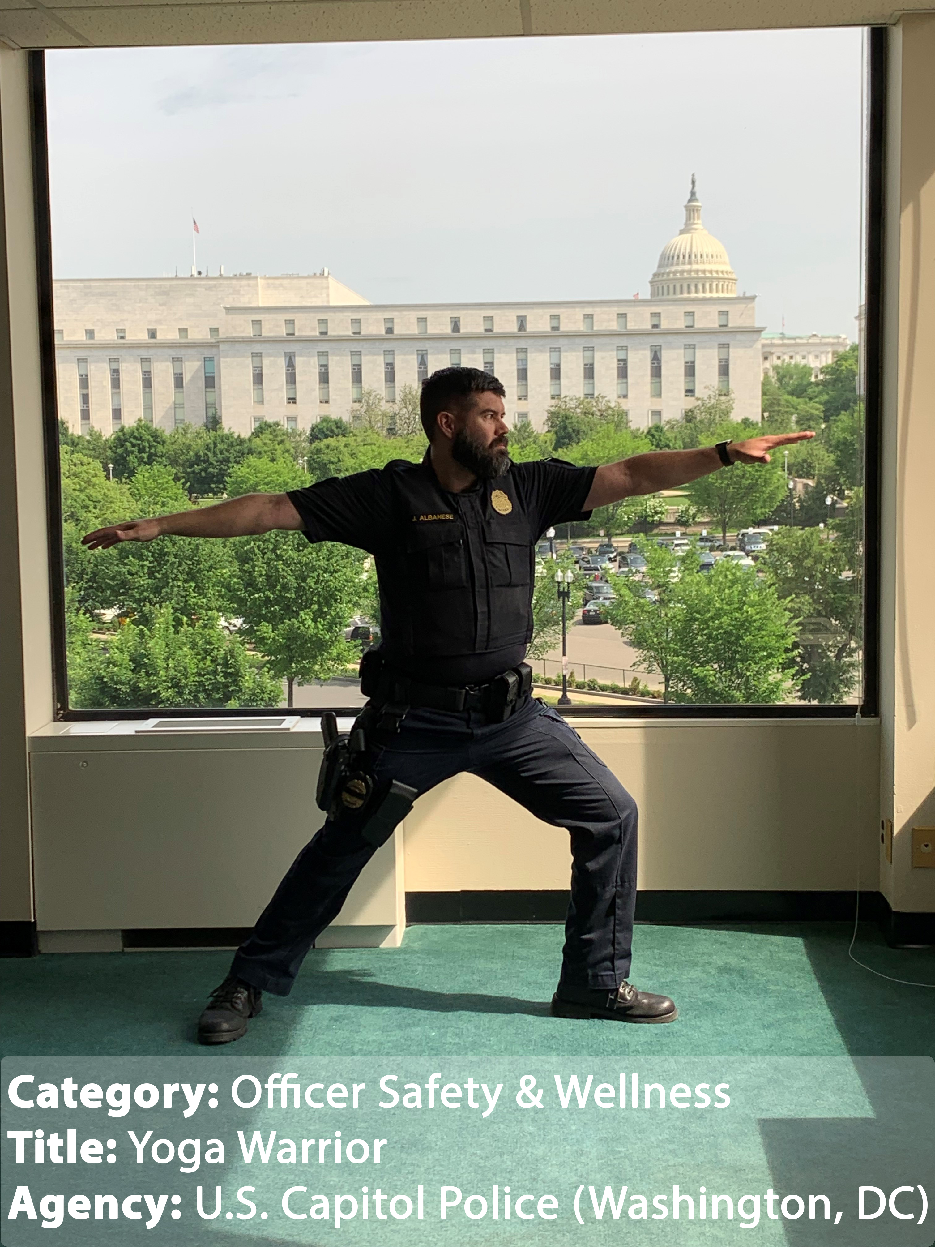 USCP Officer Jeff Albanese stands with conviction in the Warrior II yoga pose at the Howard C. Liebengood Center for Wellness with the U.S. Capitol in the background.